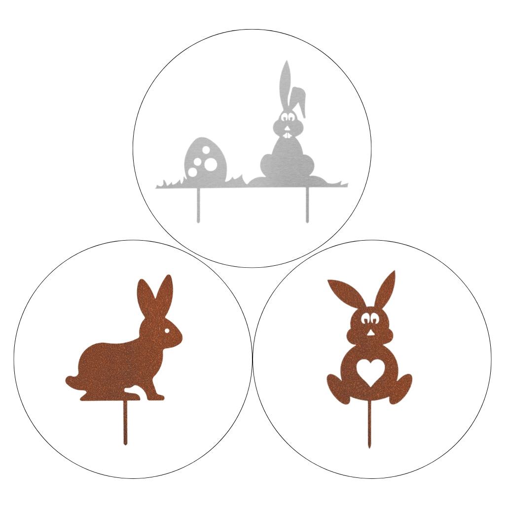 Gartenstecker-Set Ostern 1 mit drei verschiedenen Motiven: Osterhase mit Osterei aus Edelstahl, sitzender Osterhase und Osterhase mit Herz aus Cortenstahl.